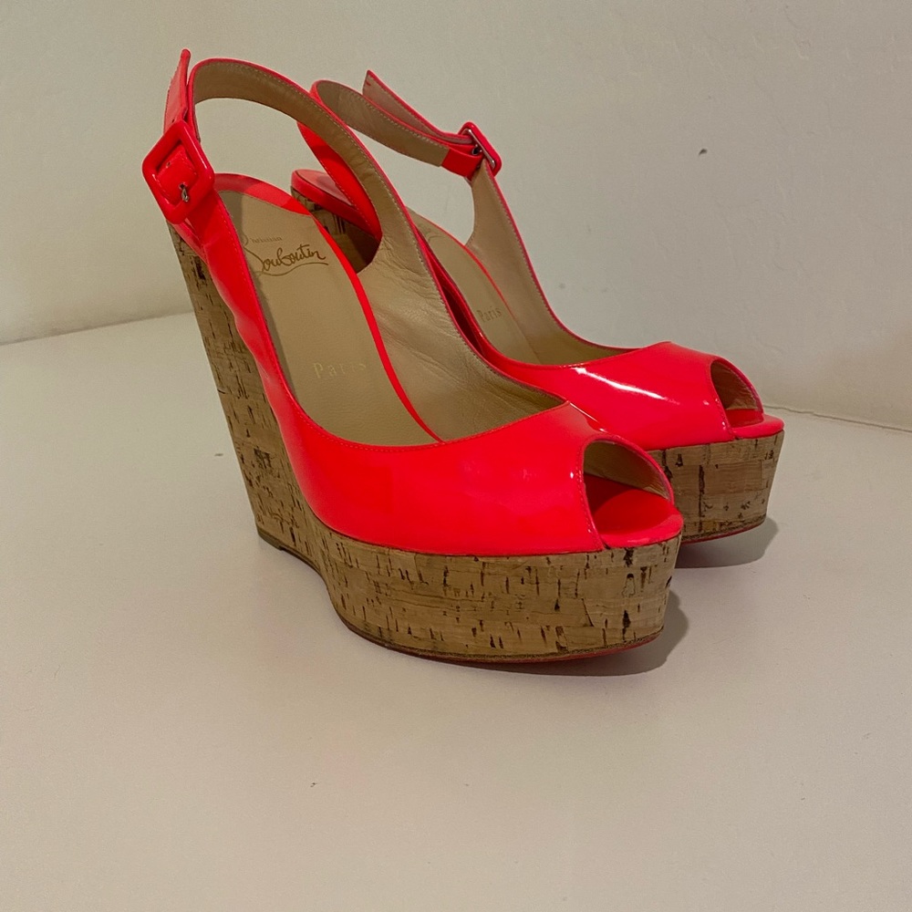 Christian Louboutin hot pink patenleather slingback wedge heels
